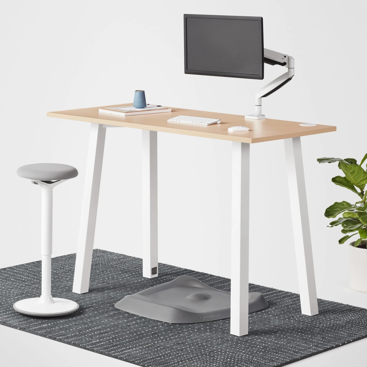fully-boden-standing-height-desk-white-frame-laminate-maple-hero-environmental-v1